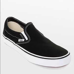 Vans black and white classic slip on
